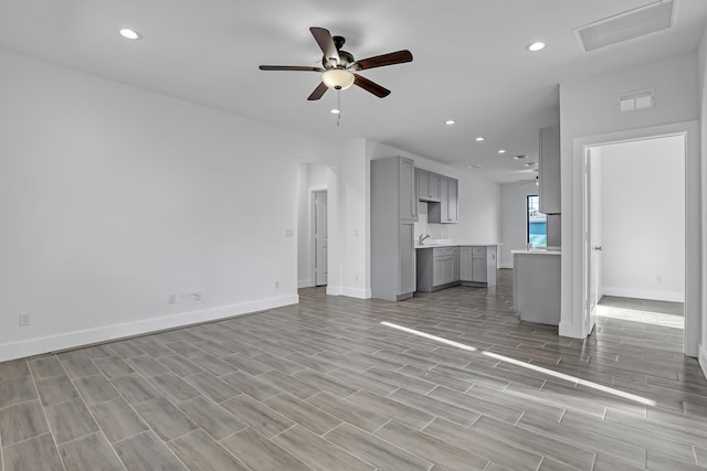 311 Ocean Pkwy, Boynton Beach, FL 33435 - unfurnished living room featuring recessed lighting, visible vents, baseboards, and a ceiling fan