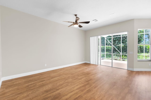 13594 Morocca Lake Ln, Delray Beach, FL 33446 - unfurnished room featuring light wood-style floors, baseboards, and ceiling fan