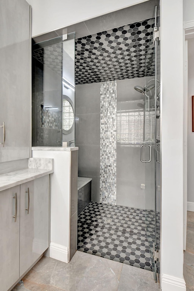 bathroom featuring a shower stall