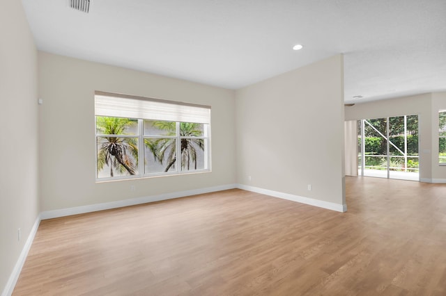 13594 Morocca Lake Ln, Delray Beach, FL 33446 - spare room with baseboards, light wood-type flooring, and recessed lighting