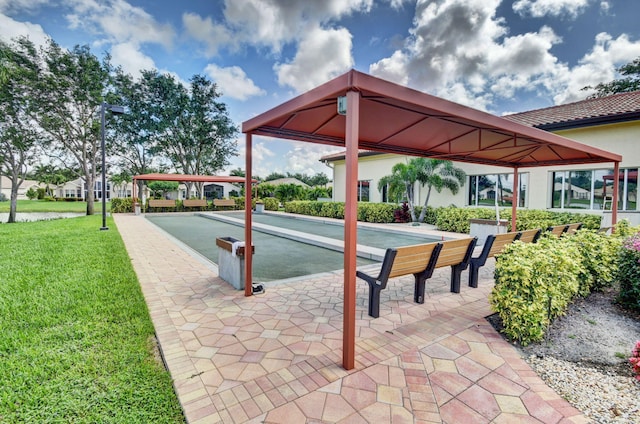 13594 Morocca Lake Ln, Delray Beach, FL 33446 - view of community featuring a game area, a lawn, and a water view