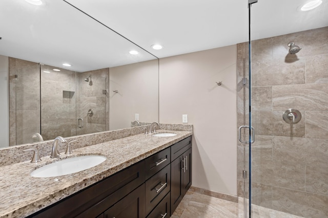 9940 NW 6th Pl, Plantation, FL 33324 - bathroom featuring recessed lighting, a sink, double vanity, and a stall shower