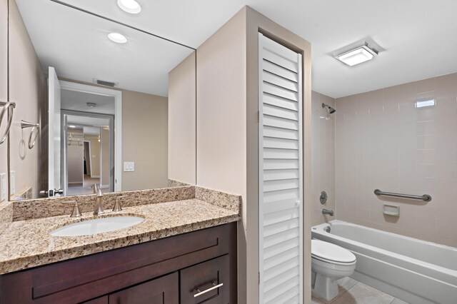 9940 NW 6th Pl, Plantation, FL 33324 - bathroom with tile patterned floors, visible vents, shower / bath combination, toilet, and vanity