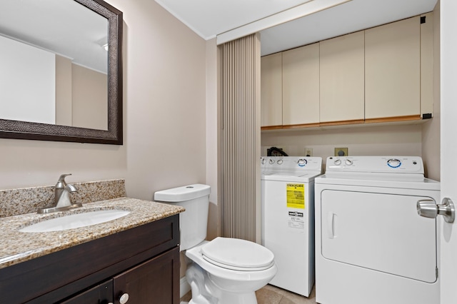 9940 NW 6th Pl, Plantation, FL 33324 - half bath with washer and dryer, toilet, vanity, and tile patterned floors