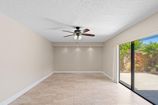 9940 NW 6th Pl, Plantation, FL 33324 - empty room with a textured ceiling, a ceiling fan, and baseboards