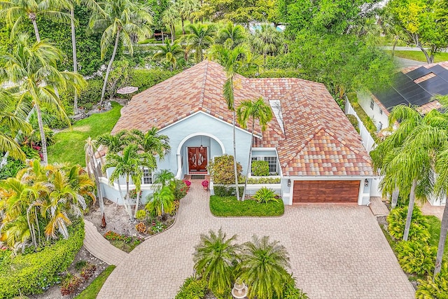 6106 Vista Linda Ln, Boca Raton, FL 33433 - view of front of property with a garage, driveway, stucco siding, and a tiled roof