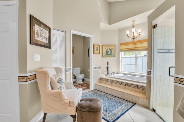 6106 Vista Linda Ln, Boca Raton, FL 33433 - bathroom with a garden tub, toilet, tile patterned floors, a notable chandelier, and baseboards