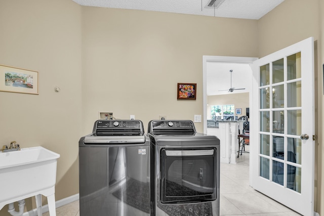 6106 Vista Linda Ln, Boca Raton, FL 33433 - laundry area featuring laundry area, ceiling fan, light tile patterned floors, independent washer and dryer, and a sink