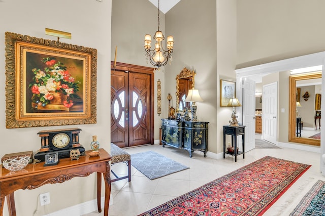 6106 Vista Linda Ln, Boca Raton, FL 33433 - foyer with a chandelier, high vaulted ceiling, baseboards, and tile patterned flooring