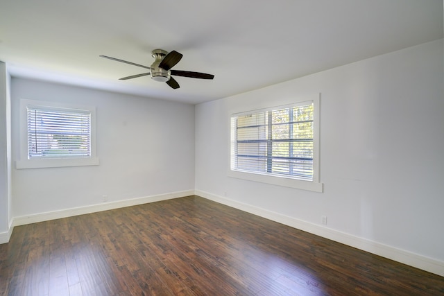 140 Lake Meryl Dr Unit 133, West Palm Beach, FL 33411 - unfurnished room with plenty of natural light, a ceiling fan, dark wood-style flooring, and baseboards