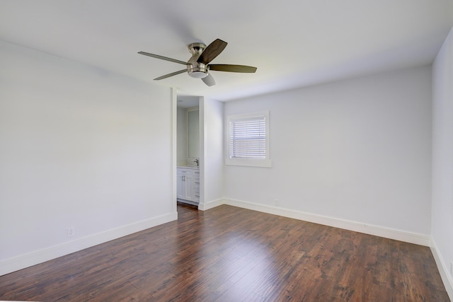 140 Lake Meryl Dr Unit 133, West Palm Beach, FL 33411 - unfurnished room with a ceiling fan, dark wood-type flooring, and baseboards