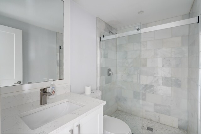 140 Lake Meryl Dr Unit 133, West Palm Beach, FL 33411 - full bathroom with toilet, a shower stall, and vanity
