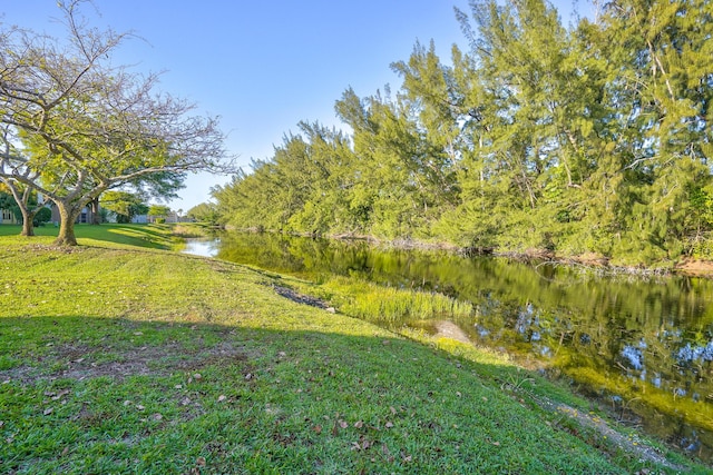 140 Lake Meryl Dr Unit 133, West Palm Beach, FL 33411 - view of yard with a water view