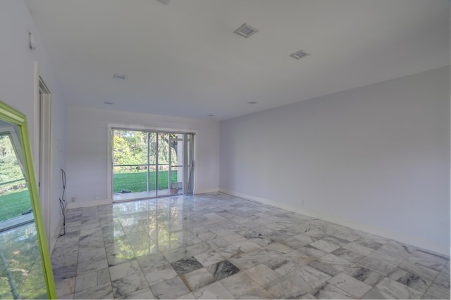 140 Lake Meryl Dr Unit 133, West Palm Beach, FL 33411 - unfurnished room featuring light marble finish flooring and baseboards