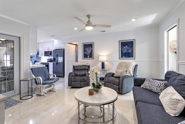 living area featuring recessed lighting, visible vents, and ceiling fan