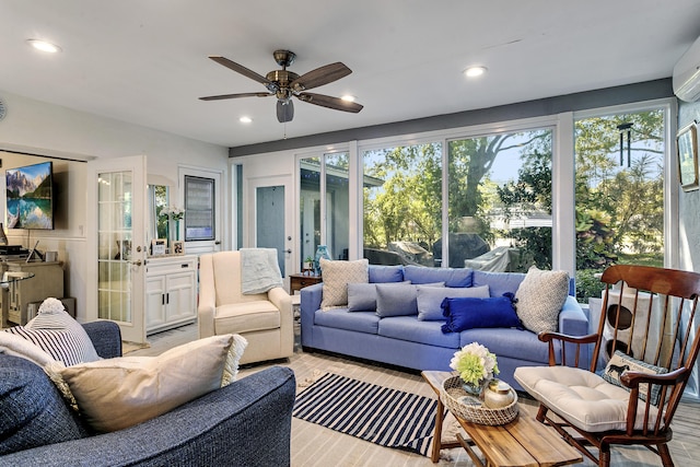living room featuring recessed lighting, a wealth of natural light, and ceiling fan