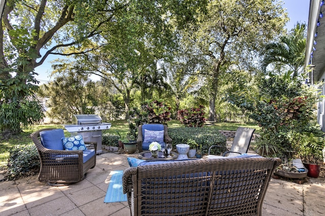 view of patio with a grill