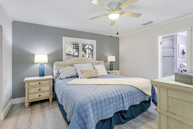 bedroom featuring a ceiling fan, baseboards, visible vents, ornamental molding, and light wood-type flooring