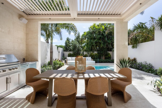 1246 George Bush, Delray Beach, FL 33483 - view of patio featuring outdoor dining area, a fenced backyard, exterior kitchen, and area for grilling