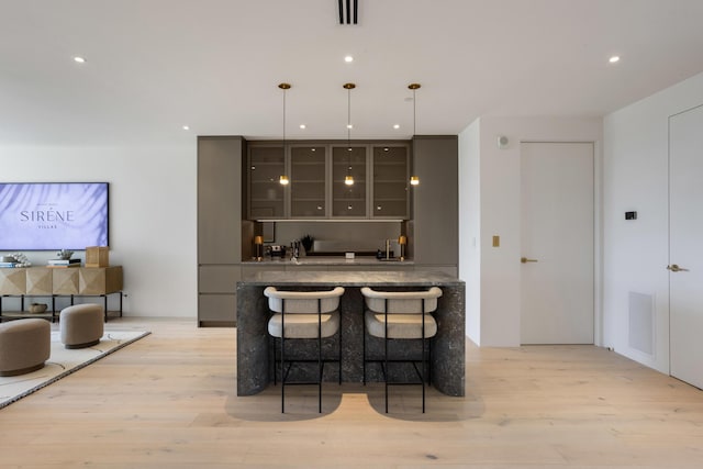 1246 George Bush, Delray Beach, FL 33483 - bar with light wood-type flooring, recessed lighting, visible vents, and decorative light fixtures