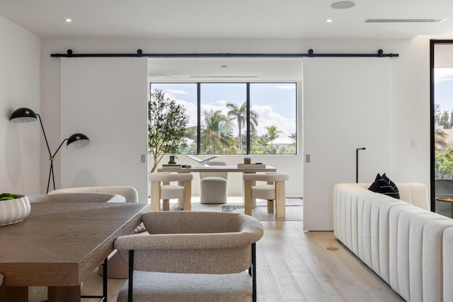 1246 George Bush, Delray Beach, FL 33483 - interior space featuring recessed lighting, visible vents, a barn door, and light wood-style flooring