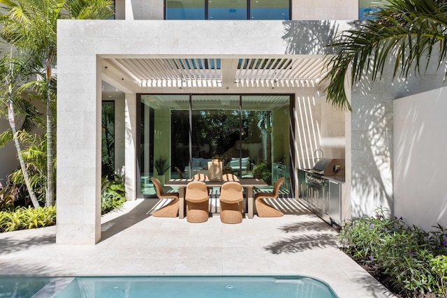 1246 George Bush, Delray Beach, FL 33483 - outdoor pool featuring a pergola, exterior kitchen, and a patio area
