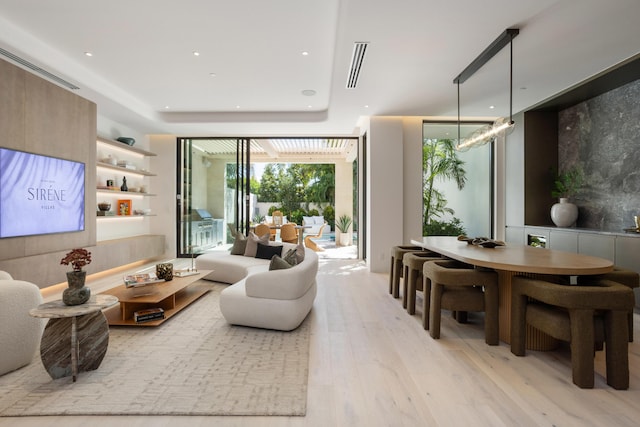 1246 George Bush, Delray Beach, FL 33483 - living area with recessed lighting, visible vents, a wall of windows, and light wood finished floors
