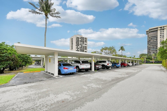 2400 Presidential Way Unit 302, West Palm Beach, FL 33401 - view of partially covered parking lot