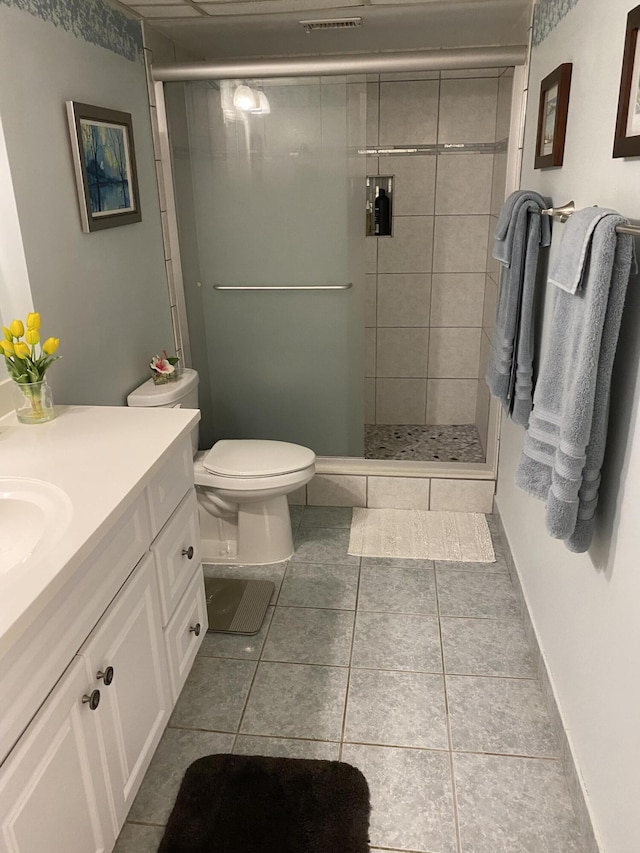 1800 SE Saint Lucie Blvd Unit 5203, Stuart, FL 34996 - full bath featuring vanity, a shower stall, toilet, and tile patterned flooring