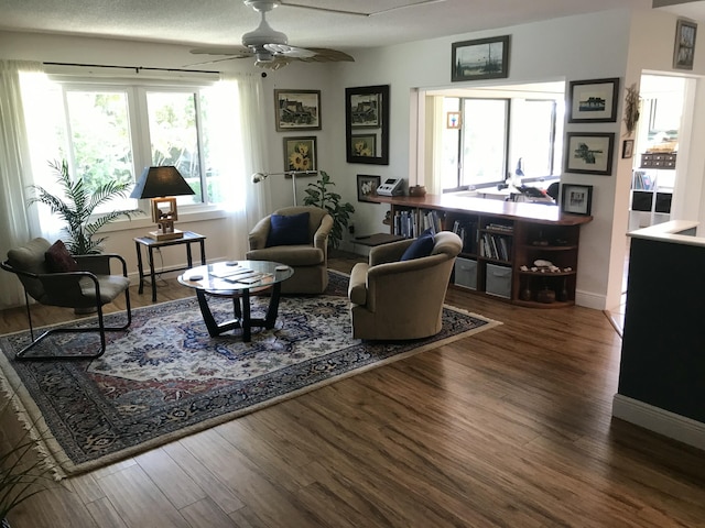 1800 SE Saint Lucie Blvd Unit 5203, Stuart, FL 34996 - living room with wood finished floors, ceiling fan, and baseboards