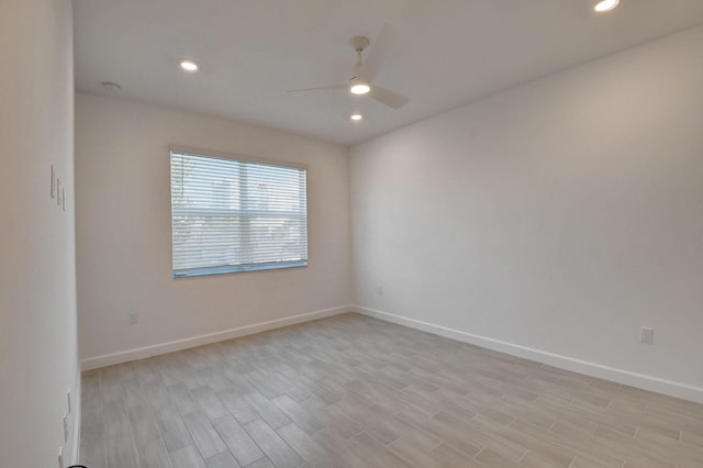 6975 Peters Ln, Delray Beach, FL 33446 - spare room with recessed lighting, baseboards, light wood-type flooring, and ceiling fan