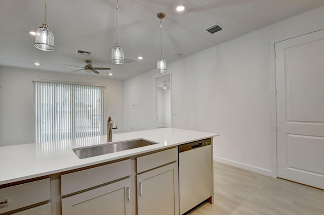 6975 Peters Ln, Delray Beach, FL 33446 - kitchen featuring stainless steel dishwasher, hanging light fixtures, visible vents, and a sink