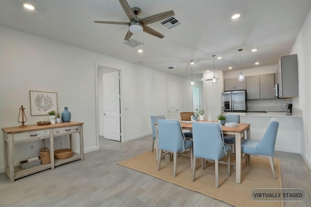 6975 Peters Ln, Delray Beach, FL 33446 - dining space with recessed lighting, visible vents, light wood finished floors, and ceiling fan