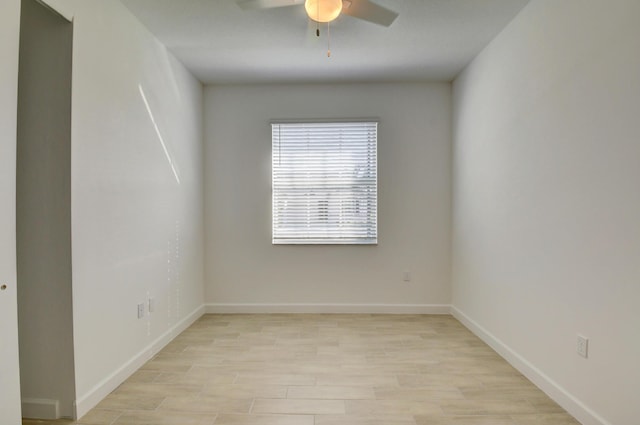 6975 Peters Ln, Delray Beach, FL 33446 - spare room featuring baseboards, a ceiling fan, and light wood finished floors