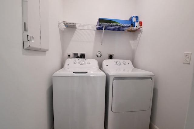 6975 Peters Ln, Delray Beach, FL 33446 - laundry area with washer and dryer and laundry area