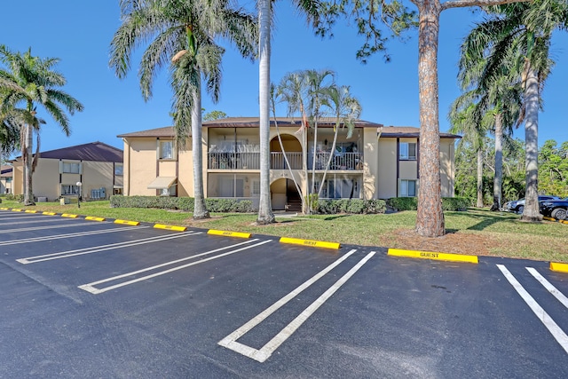 436 Pine Glen Ln Unit C-2, Greenacres, FL 33463 - view of uncovered parking lot