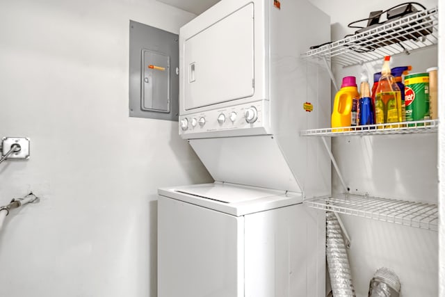 436 Pine Glen Ln Unit C-2, Greenacres, FL 33463 - clothes washing area with electric panel, laundry area, and stacked washer and clothes dryer