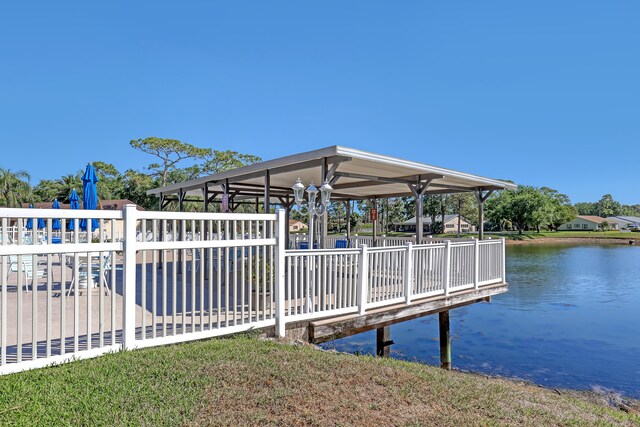 436 Pine Glen Ln Unit C-2, Greenacres, FL 33463 - view of dock featuring a water view