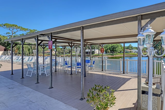 436 Pine Glen Ln Unit C-2, Greenacres, FL 33463 - view of dock with a water view and fence