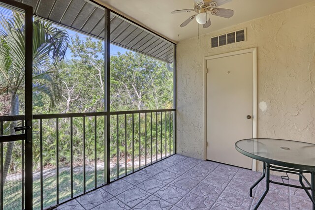 436 Pine Glen Ln Unit C-2, Greenacres, FL 33463 - unfurnished sunroom featuring visible vents and a ceiling fan