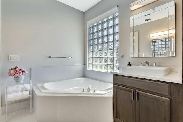 2737 Clipper Cir, West Palm Beach, FL 33411 - full bath featuring a garden tub and vanity