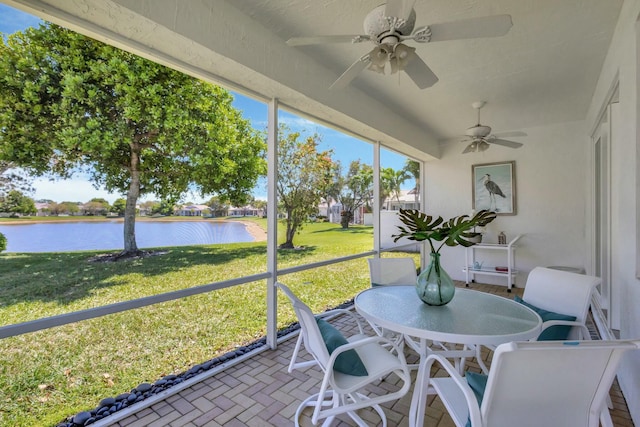 2737 Clipper Cir, West Palm Beach, FL 33411 - sunroom / solarium with a water view, a ceiling fan, outdoor dining area, and vaulted ceiling
