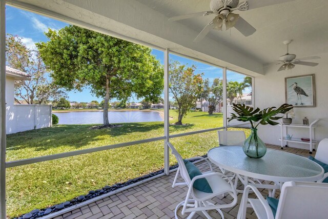 2737 Clipper Cir, West Palm Beach, FL 33411 - sunroom / solarium with a water view, ceiling fan, and outdoor dining area