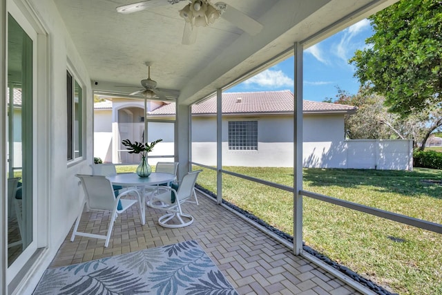 2737 Clipper Cir, West Palm Beach, FL 33411 - sunroom / solarium with ceiling fan and outdoor dining area