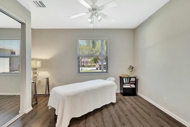 2737 Clipper Cir, West Palm Beach, FL 33411 - bedroom with wood finished floors, baseboards, and ceiling fan