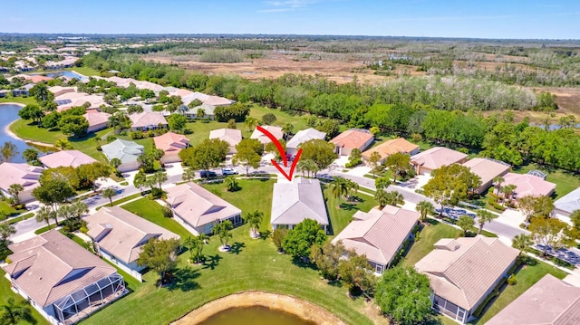 2737 Clipper Cir, West Palm Beach, FL 33411 - aerial overview of property's location featuring nearby suburban area and a large body of water