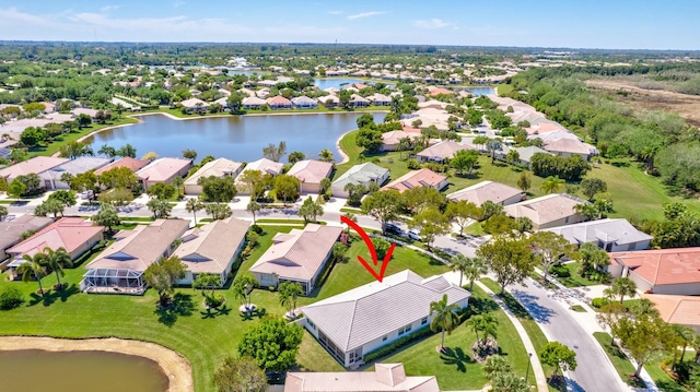 2737 Clipper Cir, West Palm Beach, FL 33411 - aerial perspective of suburban area with a nearby body of water