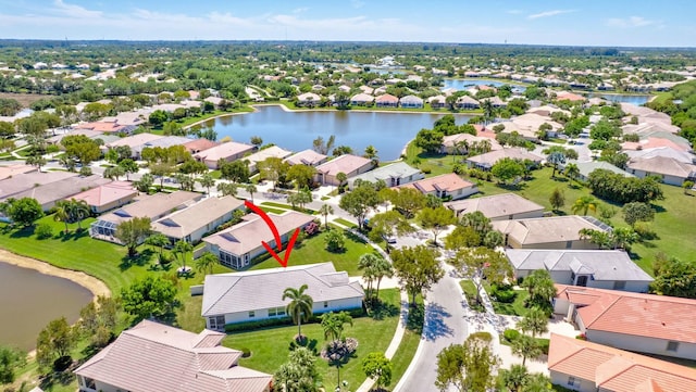 2737 Clipper Cir, West Palm Beach, FL 33411 - aerial view of residential area with a nearby body of water