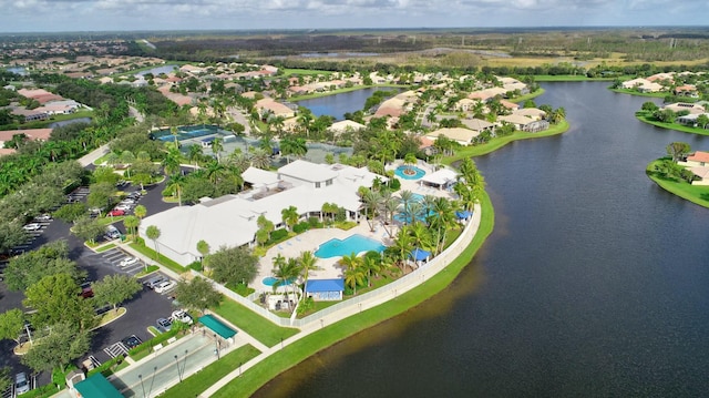 2737 Clipper Cir, West Palm Beach, FL 33411 - aerial perspective of suburban area with a large body of water and a pool area