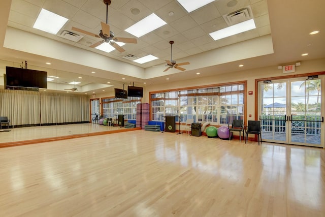 2737 Clipper Cir, West Palm Beach, FL 33411 - exercise area featuring a ceiling fan, wood finished floors, a drop ceiling, a raised ceiling, and recessed lighting